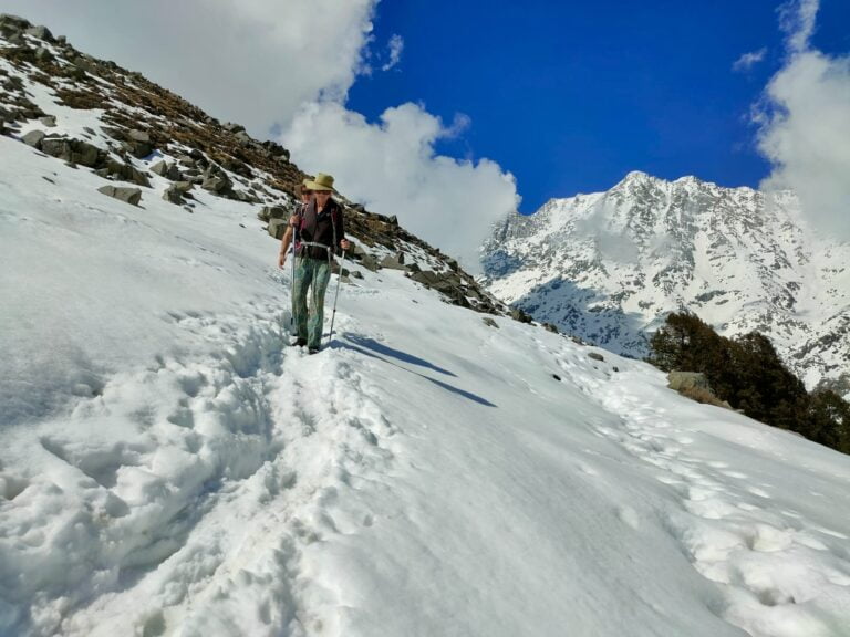 a man hiking on a snowy mountain