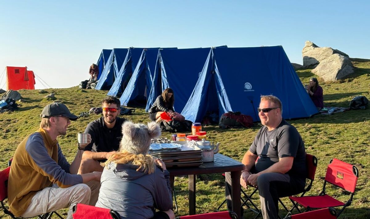 Tent pitched at Triund campsite with Dhauladhar mountain view