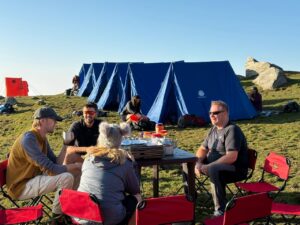 Tent pitched at Triund campsite with Dhauladhar mountain view