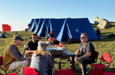 Tent pitched at Triund campsite with Dhauladhar mountain view
