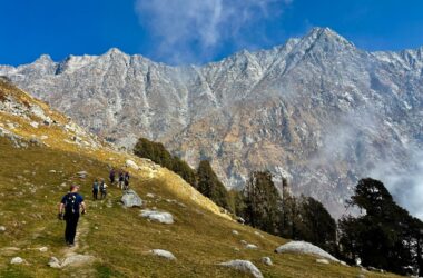 Scenic view of Dharamshala with Dhauladhar mountains under changing weather conditions
