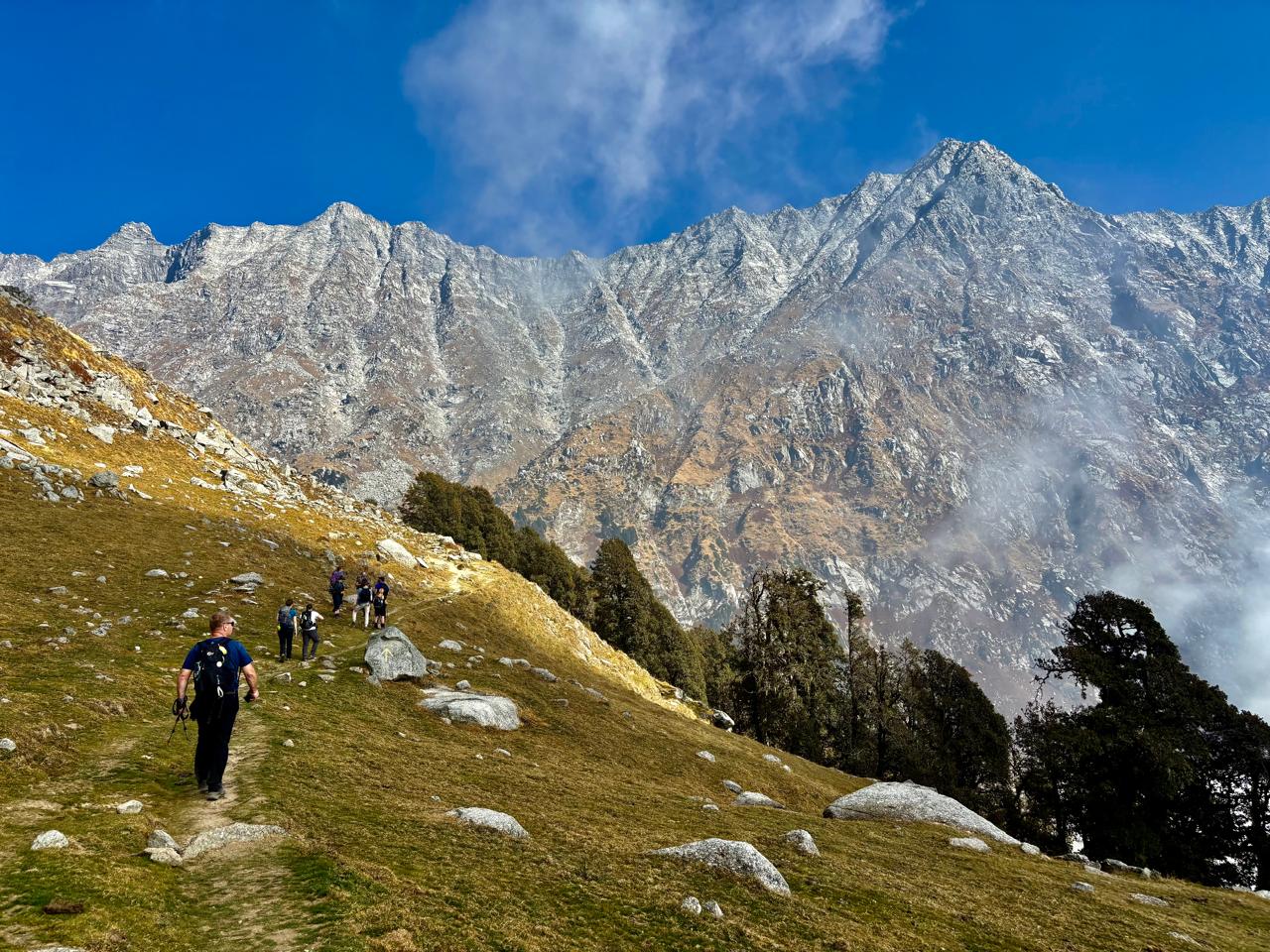 Scenic view of Dharamshala with Dhauladhar mountains under changing weather conditions