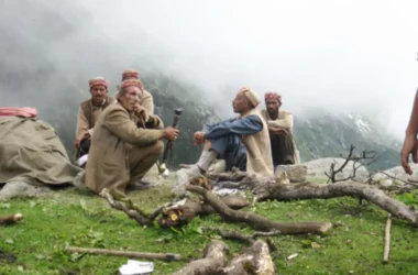 Trekkers crossing Indrahar Pass on the Shepherd Trail Trek in Himachal Pradesh