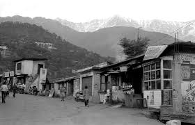 Old Dharamshala street view with Dhauladhar mountains in the background