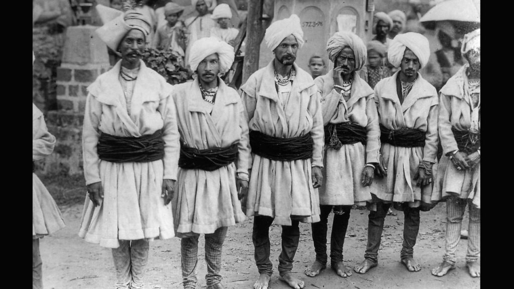 Traditional Gaddi men in Himachal Pradesh wearing woolen robes and turbans